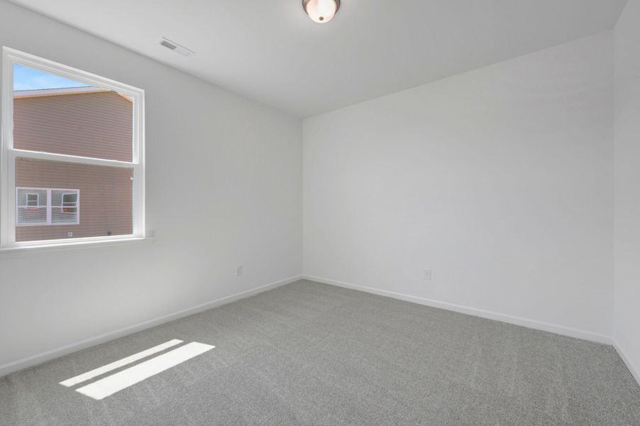 Spacious, unfurnished interior of a new home in Providence Creek, Fuquay Varina (Image 19).