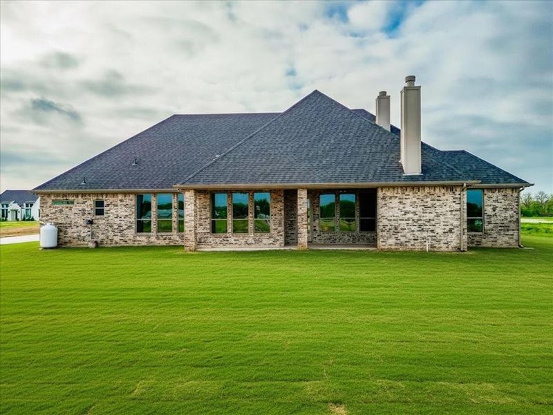 Exterior details and patio area of a home in , Granbury (Image 26).