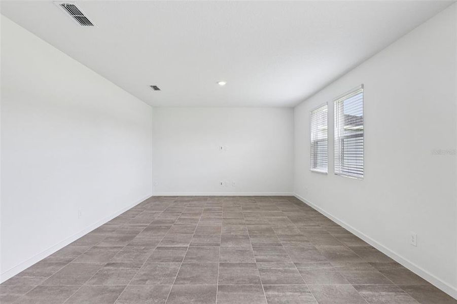 Spacious, unfurnished interior of a new home in Flagler Village - Signature Series, Palm Coast (Image 26). Spacious, unfurnished interior of a new home in Flagler Village - Signature Series, Palm Coast (Image 26).