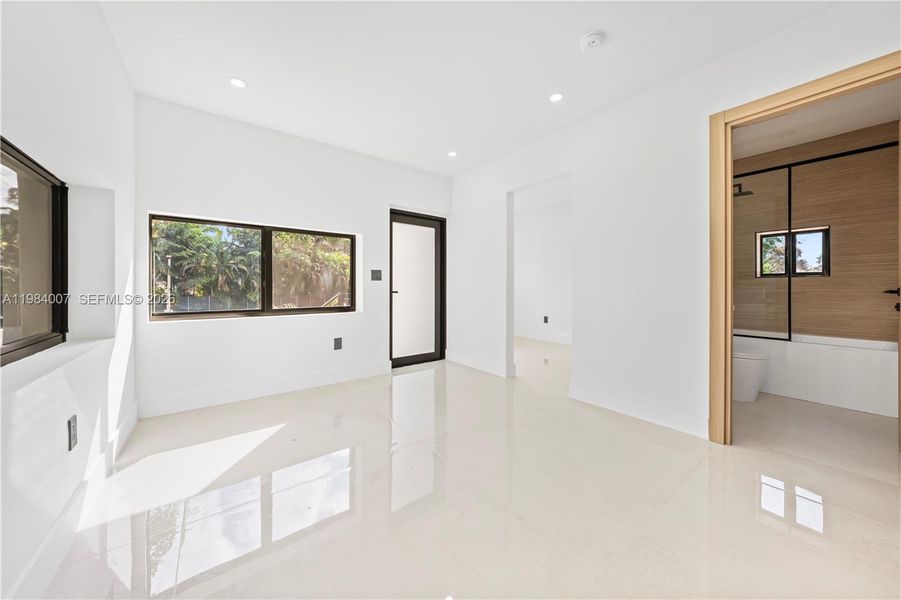 Spacious, unfurnished interior of a new home in , North Miami (Image 54).