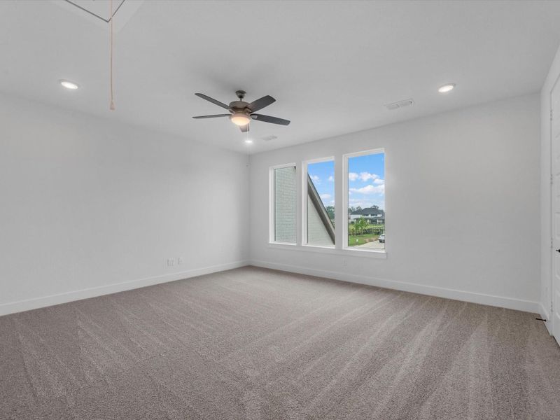Spacious, unfurnished interior of a new home in The Estates at James Lane, Fulshear (Image 17).