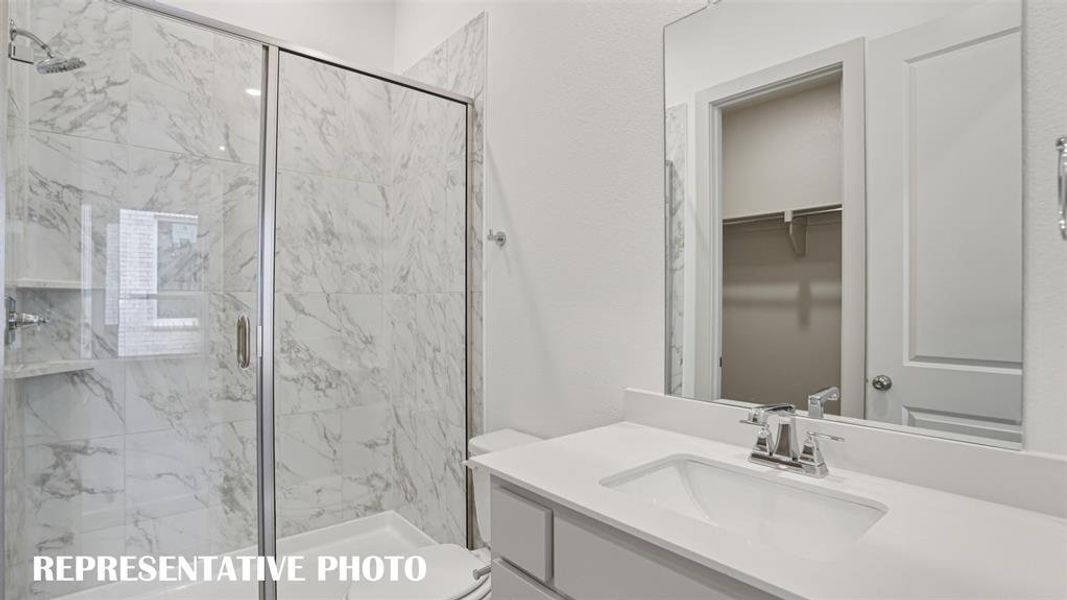 Guests will feel right at home in either of the beautifully finished guest baths in our Brice II plan.  REPRESENTATIVE PHOTO