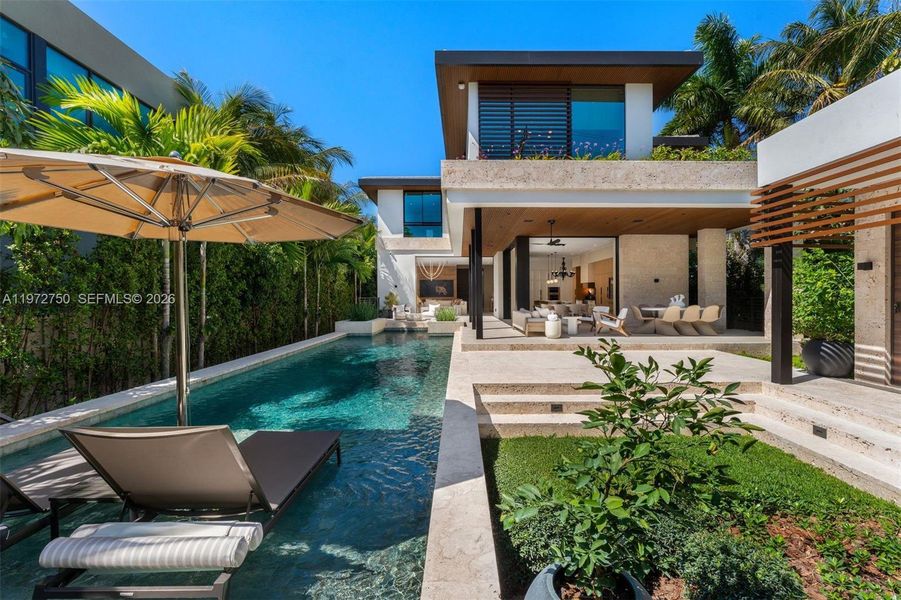 Exterior details and patio area of a home in , Miami Beach (Image 2). Exterior details and patio area of a home in , Miami Beach (Image 2).