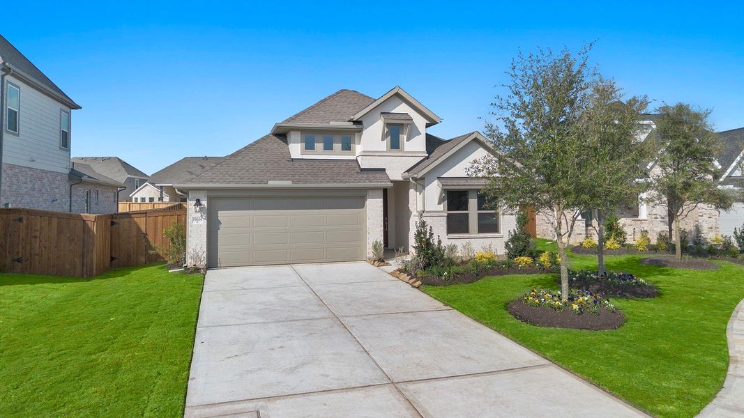 Front exterior of a new home in Dunham Pointe 50', Cypress, TX, highlighting curb appeal (Image 20).