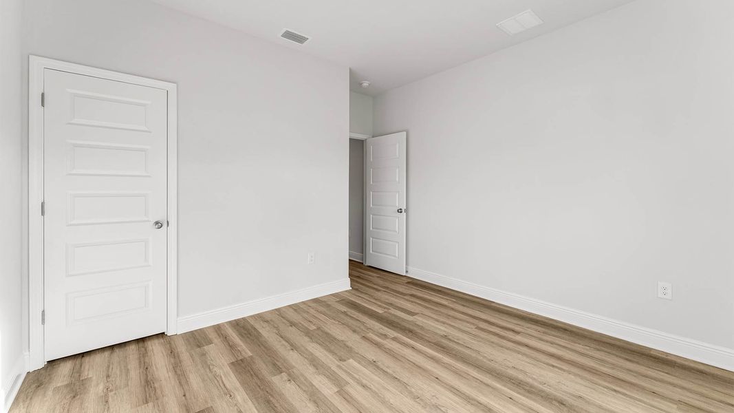 Spacious, unfurnished interior of a new home in Pine Creek and Heron Walk, Port Saint Joe (Image 15). Spacious, unfurnished interior of a new home in Pine Creek and Heron Walk, Port Saint Joe (Image 15).