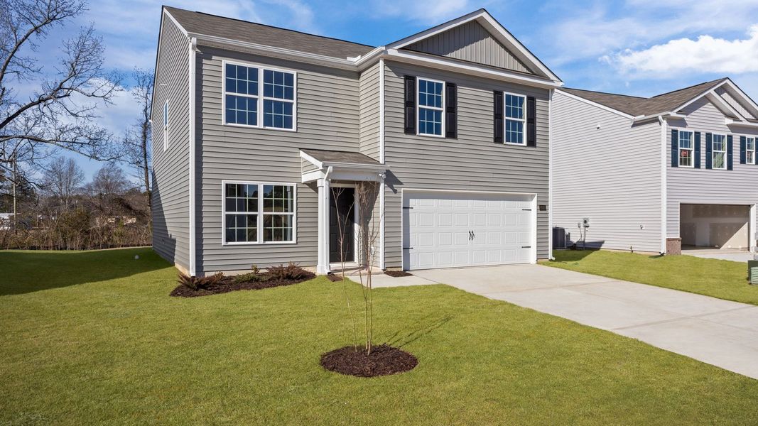 Front exterior of a new home in Madeline Farm, New Bern, NC, highlighting curb appeal (Image 17).