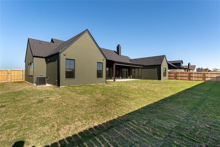 Exterior details and patio area of a home in , Woodway (Image 4).