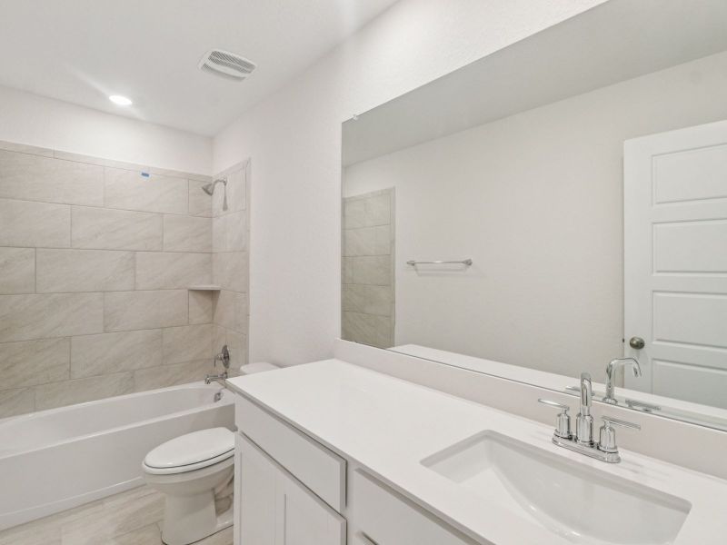 Guest bathroom in the Matador floorplan at a Meritage Homes community. Guest bathroom in the Matador floorplan at a Meritage Homes community.