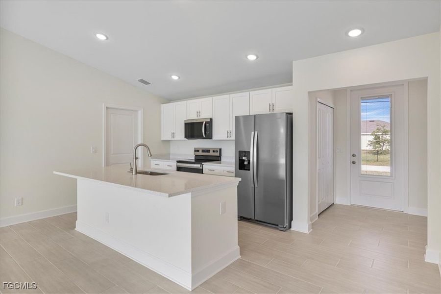 Furnished interior view inside a new home in Cape Coral, Cape Coral (Image 7). Furnished interior view inside a new home in Cape Coral, Cape Coral (Image 7).