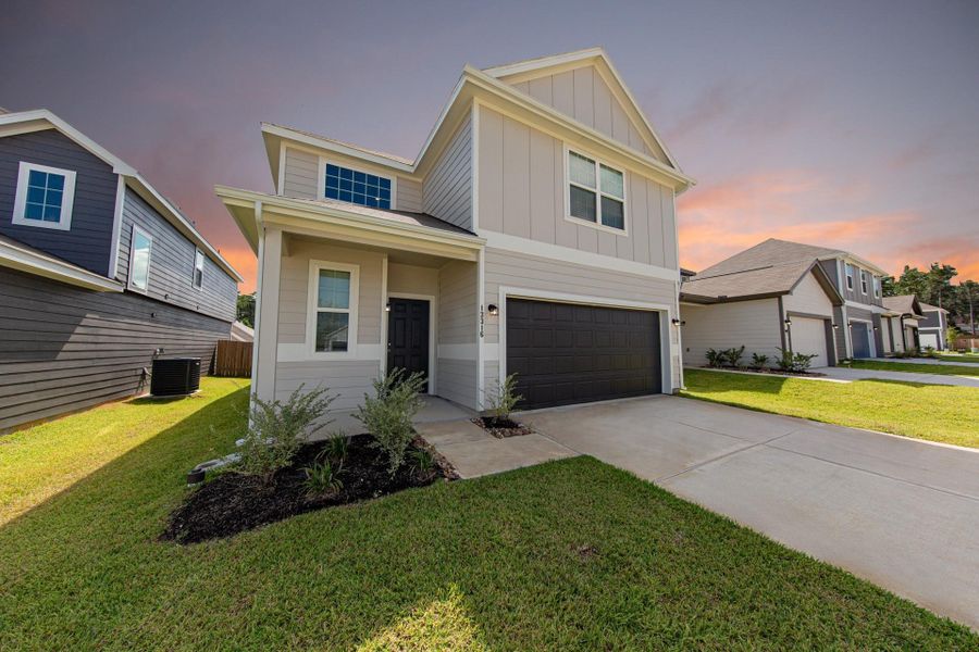 Exterior details and patio area of a home in River's Edge, Conroe (Image 2).