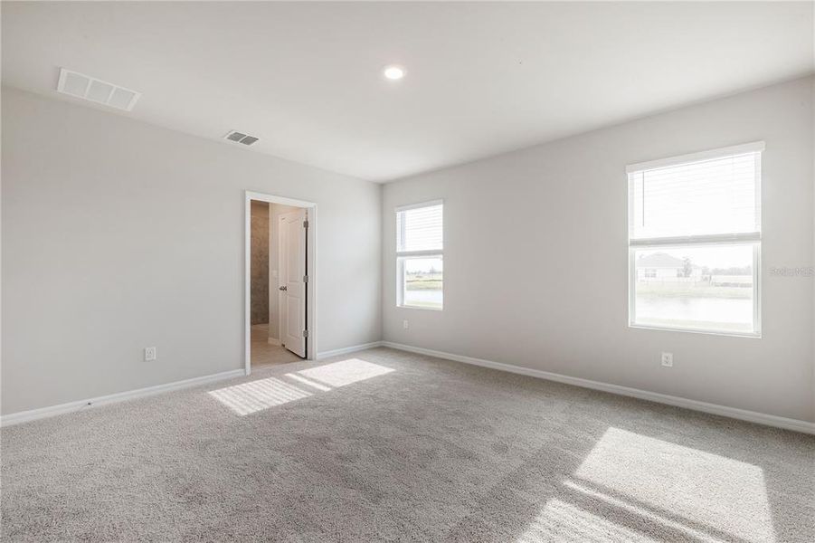 Spacious, unfurnished interior of a new home in Coral Lakes - Tradition & Express, Punta Gorda (Image 15). Spacious, unfurnished interior of a new home in Coral Lakes - Tradition & Express, Punta Gorda (Image 15).