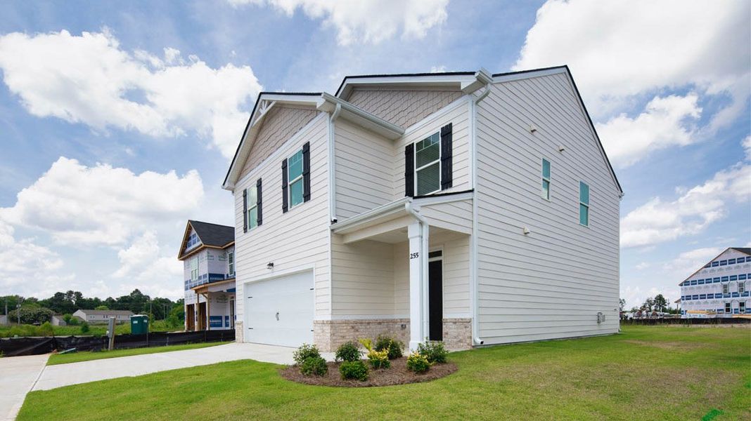 Representative exterior photo of a completed home built from the Edmon by D.R. Horton in Poplar Preserve, Newnan, GA (Image 17). Representative exterior photo of a completed home built from the Edmon by D.R. Horton in Poplar Preserve, Newnan, GA (Image 17).