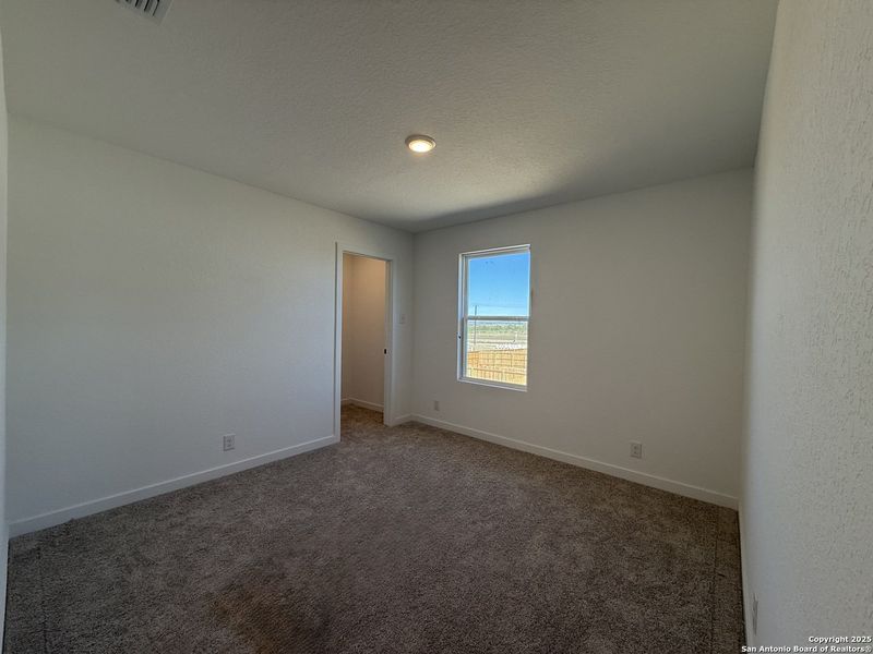 Spacious, unfurnished interior of a new home in The Preserve at the Wilder, Adkins (Image 19).