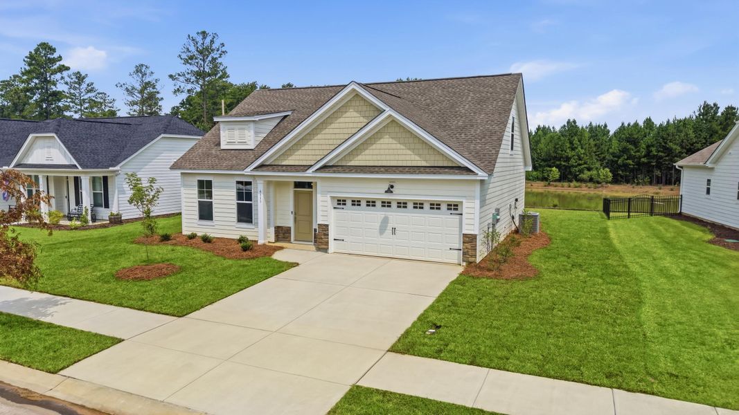Front exterior of a new home in Westwood Reserve, Conway, SC, highlighting curb appeal (Image 18).