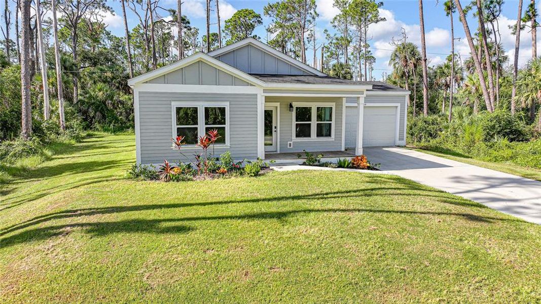 Front exterior of a new home in , Port Charlotte, FL, highlighting curb appeal (Image 18).