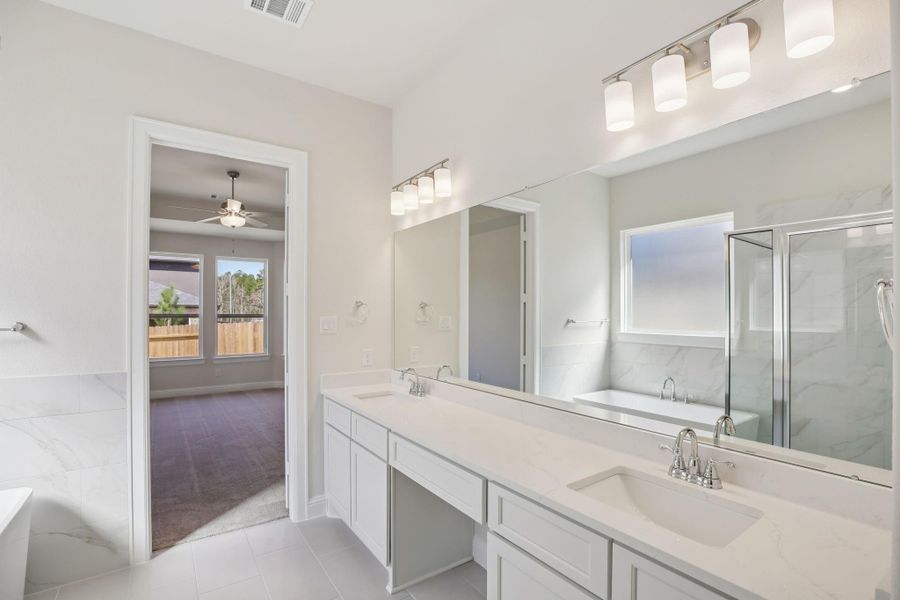 Furnished interior view inside a new home in Woodhavyn 50', Magnolia (Image 13).