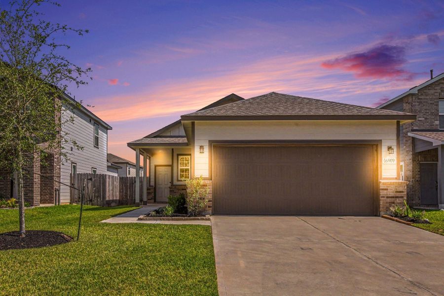 Front exterior of a new home in , Conroe, TX, highlighting curb appeal (Image 1). Front exterior of a new home in , Conroe, TX, highlighting curb appeal (Image 1).