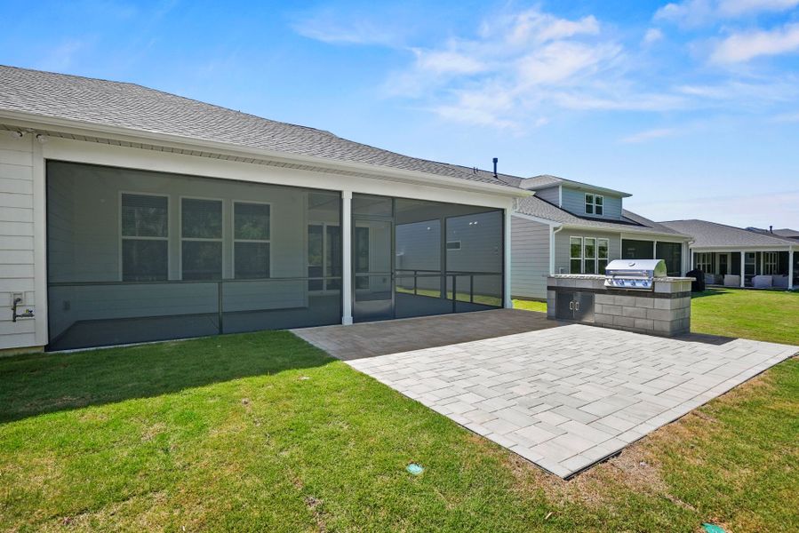 Exterior details and patio area of a home in Carolina Riverside, Belmont (Image 33).
