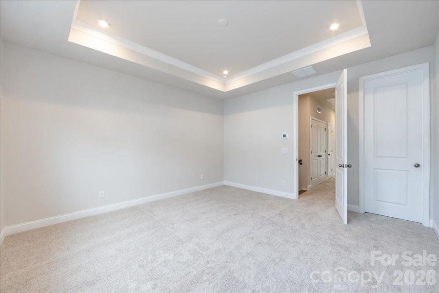 Primary Bedroom with Tray Ceiling