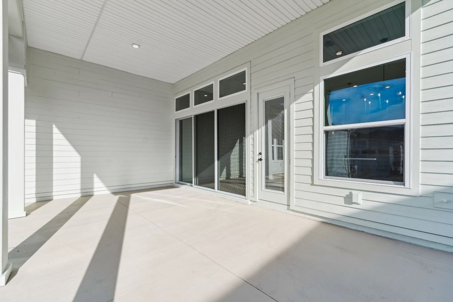 Exterior details and patio area of a home in Seven Pines 50' Rear Entry, Jacksonville (Image 3).