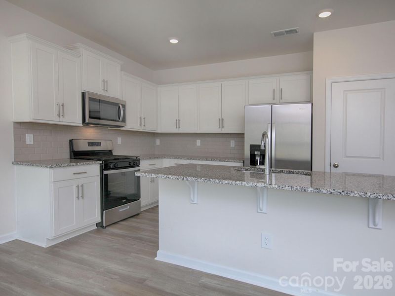 Furnished interior view inside a new home in Villas at Sherrills Ford, Terrell (Image 12).