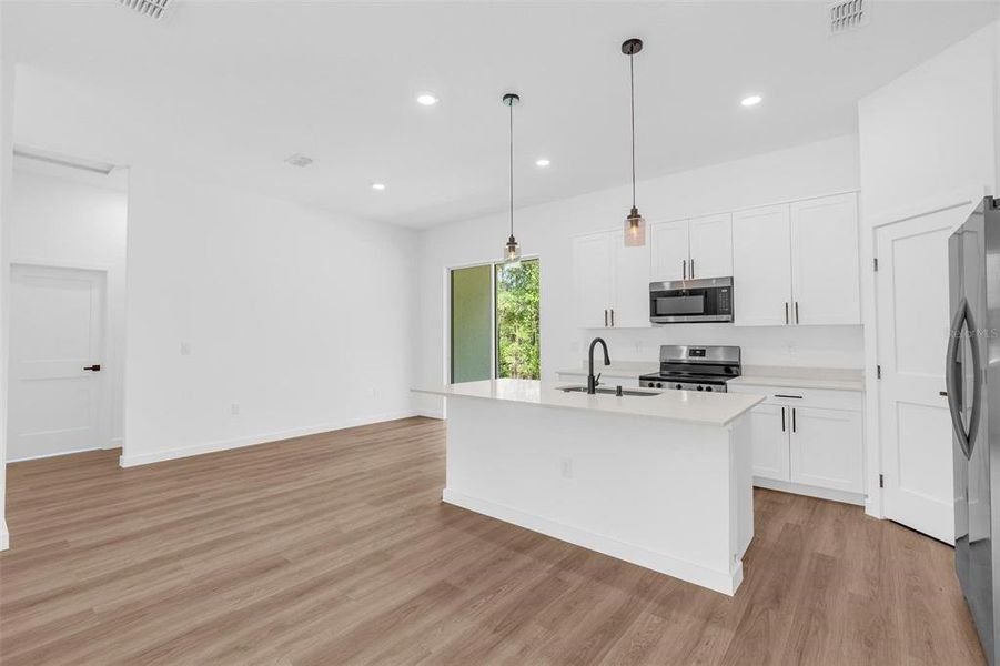 Furnished interior view inside a new home in , Dunnellon (Image 8).