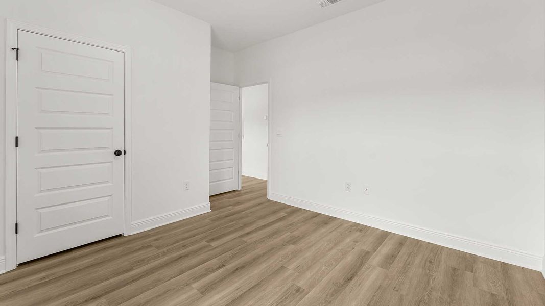 Spacious, unfurnished interior of a new home in Nellie Preserve, Santa Rosa Beach (Image 32).