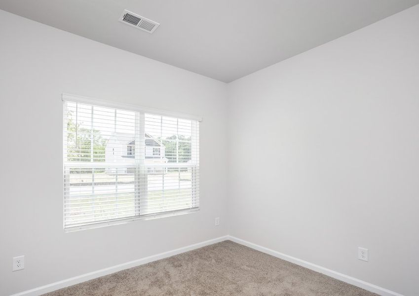 Spacious and open bedroom.