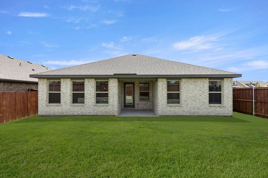 Front exterior of a new home in Northspur, Terrell, TX, highlighting curb appeal (Image 26).