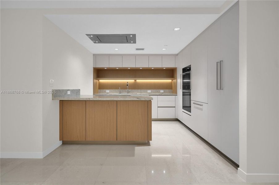 Furnished interior view inside a new home in , Bay Harbor Islands (Image 6). Furnished interior view inside a new home in , Bay Harbor Islands (Image 6).