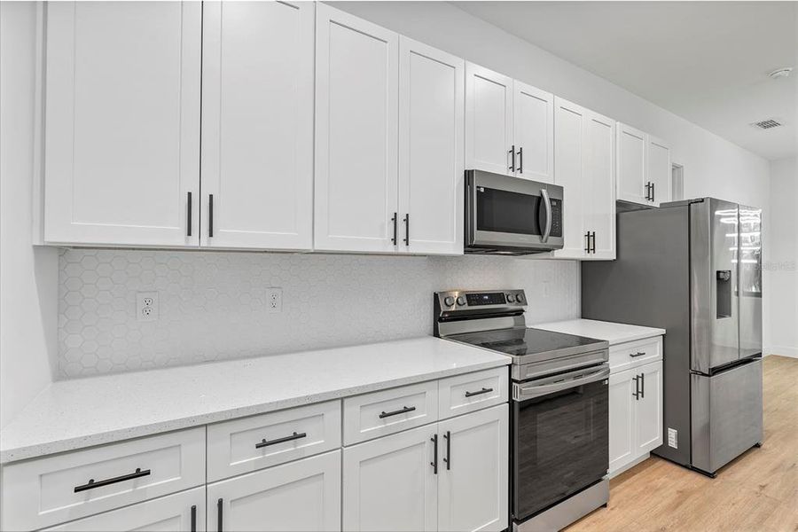 Furnished interior view inside a new home in , Port Charlotte (Image 9).