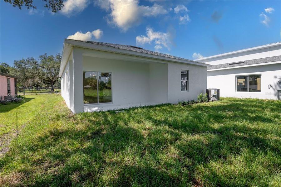 Front exterior of a new home in , Sanford, FL, highlighting curb appeal (Image 1).