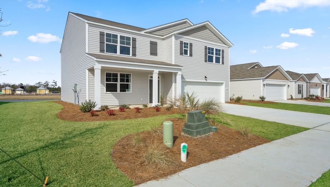 Representative exterior photo of a completed home built from the HAYDEN by D.R. Horton in Ridgefield, Conway, SC (Image 2).