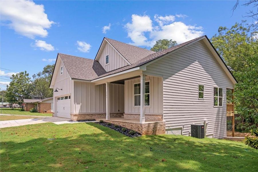 Front exterior of a new home in , Tallapoosa, GA, highlighting curb appeal (Image 24).