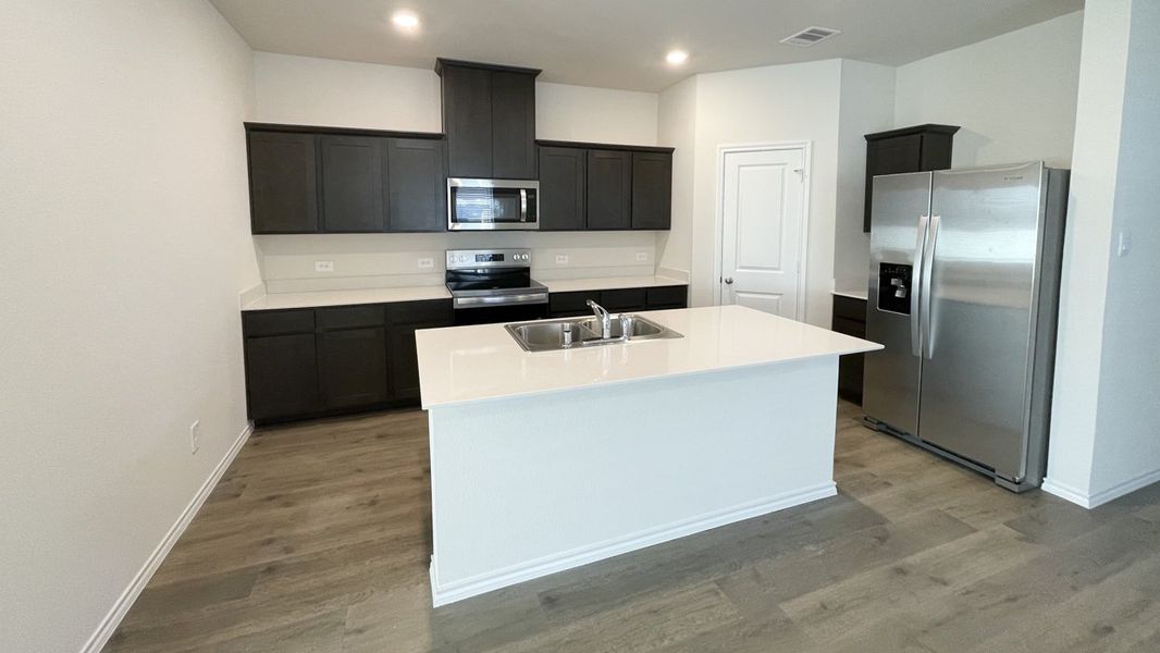 Representative furnished interior of a home built from the Peterson by D.R. Horton in Sweetwater Springs, Sherman (Image 4).