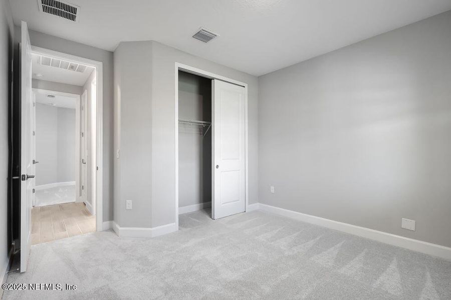 Spacious, unfurnished interior of a new home in Colbert Landings, Palm Coast (Image 22).