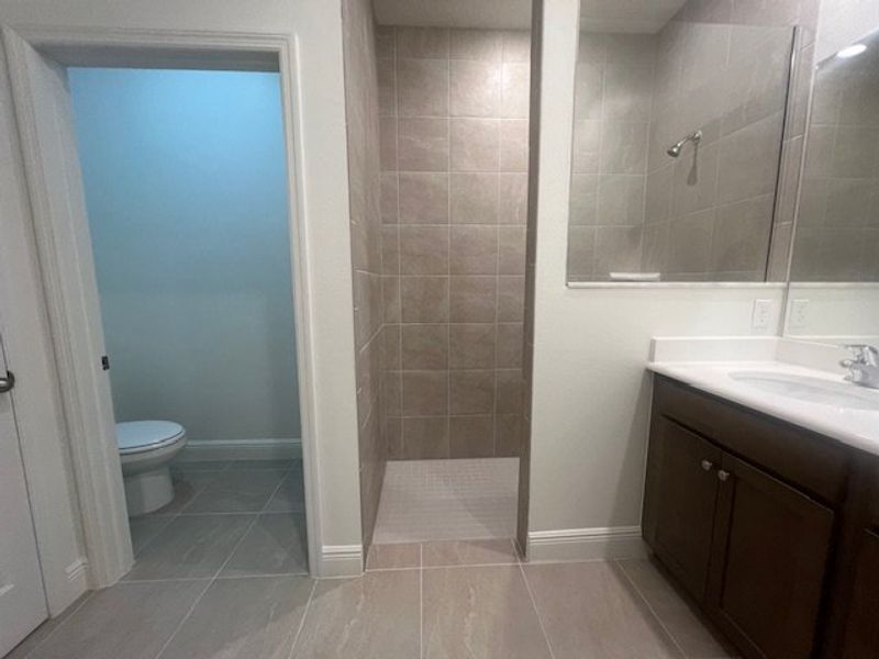 Furnished interior view inside a new home in Lakes At St Sebastian, Micco (Image 9).