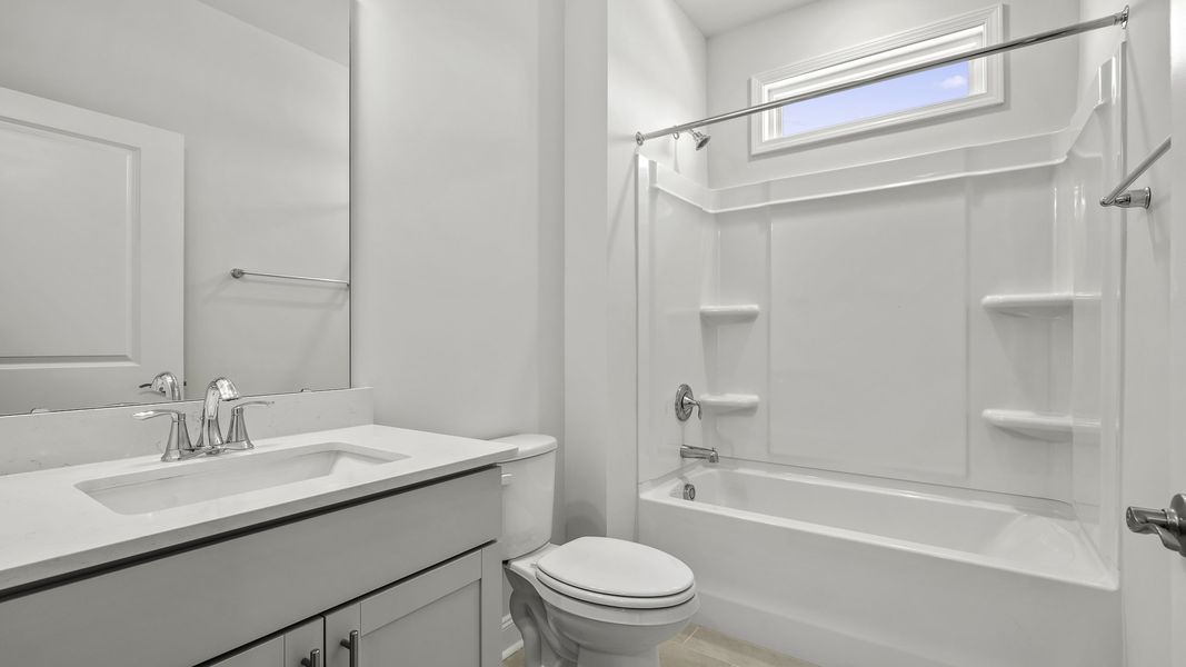 Furnished interior view inside a new home in The Villas at Kinsley, Jamestown (Image 6).