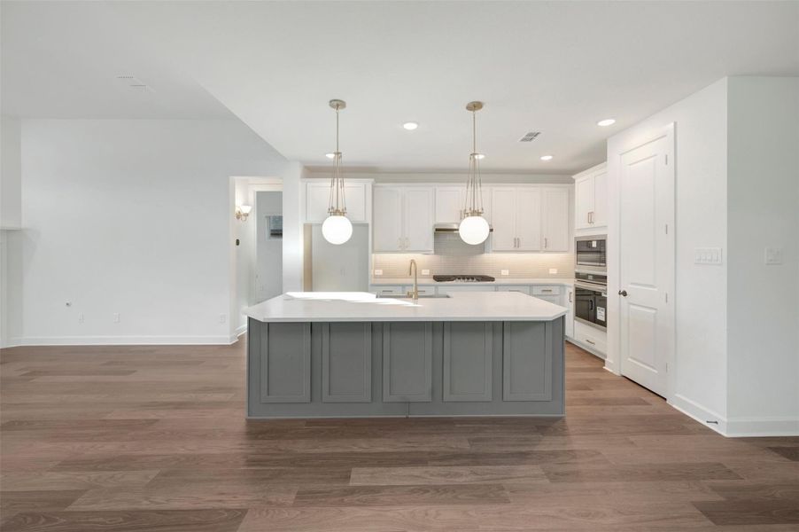 Furnished interior view inside a new home in Riceland - Enclave Collection, Mont Belvieu (Image 5).