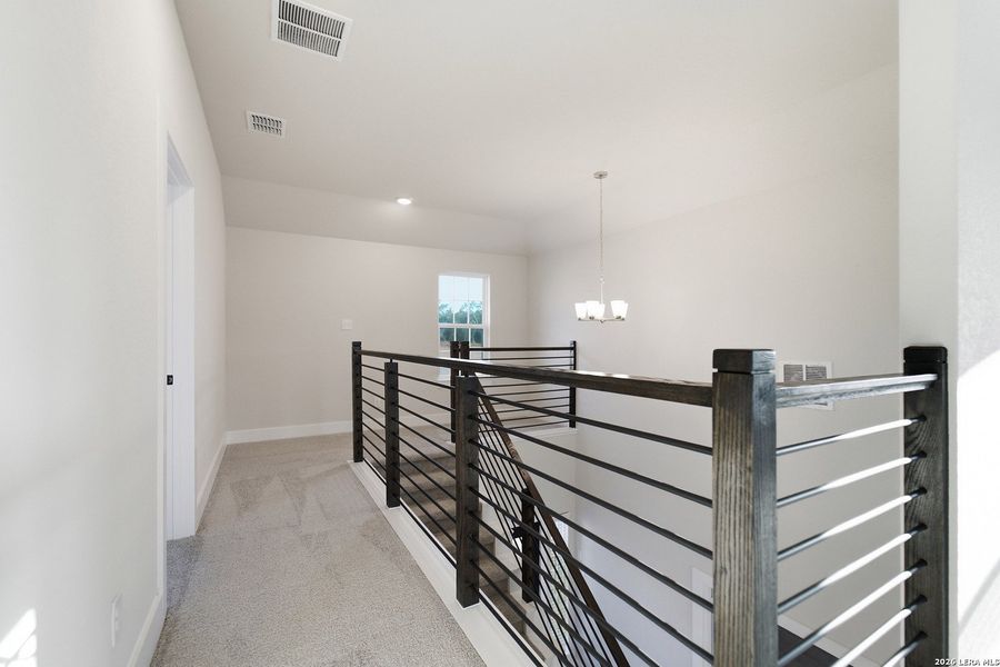 Spacious, unfurnished interior of a new home in The Woodlands at Medina Hills, Mico (Image 20).