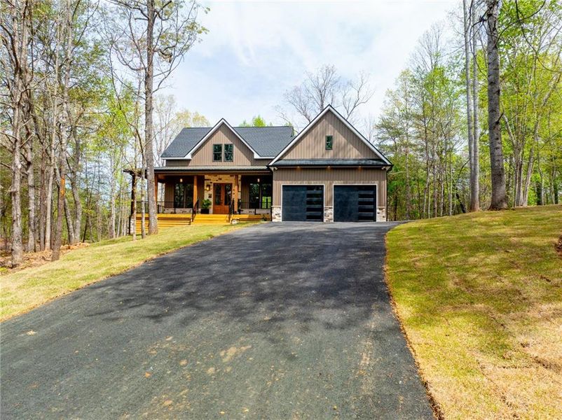 Front exterior of a new home in , Cleveland, GA, highlighting curb appeal (Image 2).