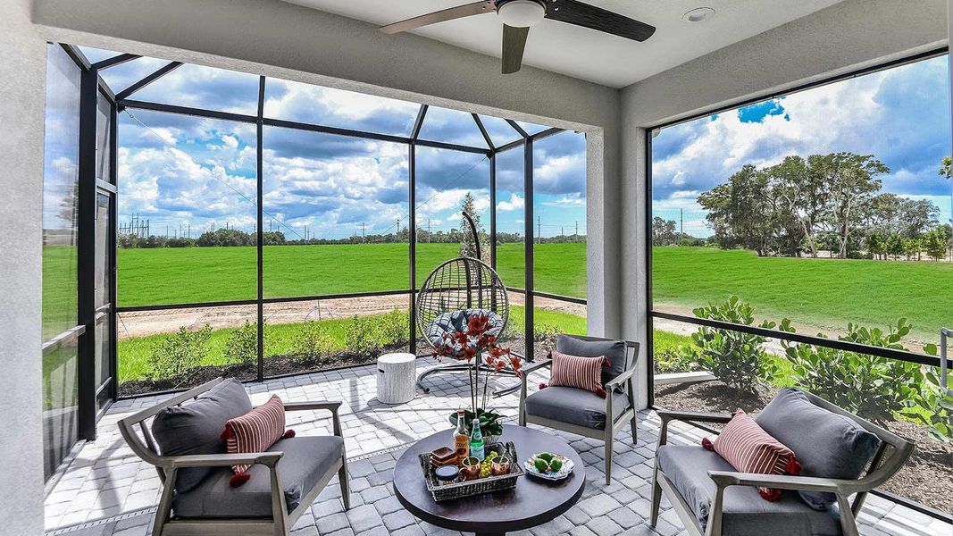Exterior details and patio area of a home in Windward Real Estate and Homes for Sale in Sarasota, FL - Neal Communities, Sarasota (Image 4).