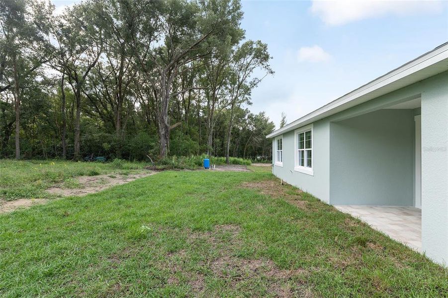 Exterior details and patio area of a home in , Summerfield (Image 29). Exterior details and patio area of a home in , Summerfield (Image 29).
