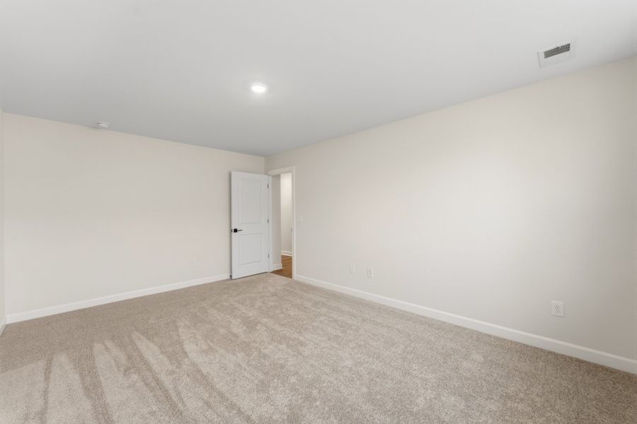 Spacious, unfurnished interior of a new home in Bens Crossing, Woodruff (Image 45).