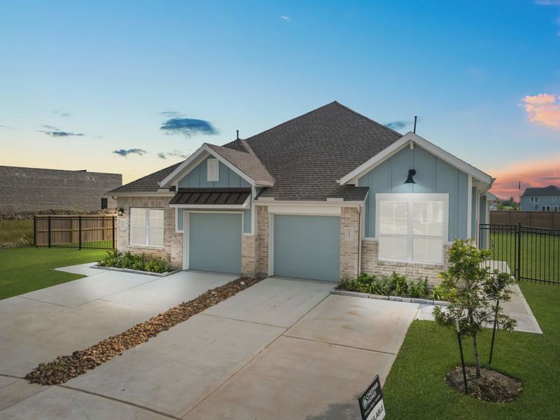 Representative exterior photo of a completed home built from the Chalet by Chesmar Homes in Meridiana Townhomes, Iowa Colony, TX (Image 24).