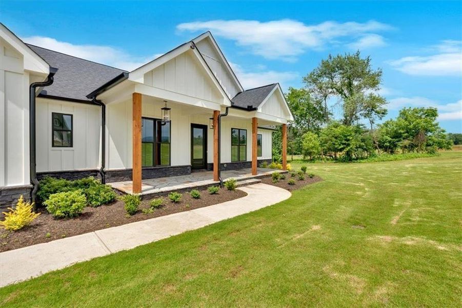 Front exterior of a new home in , Rydal, GA, highlighting curb appeal (Image 23). Front exterior of a new home in , Rydal, GA, highlighting curb appeal (Image 23).