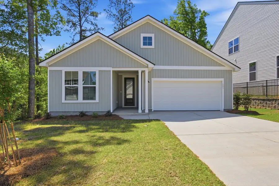 Front exterior of a new home in Grand Arbor, Blythewood, SC, highlighting curb appeal (Image 2). Front exterior of a new home in Grand Arbor, Blythewood, SC, highlighting curb appeal (Image 2).