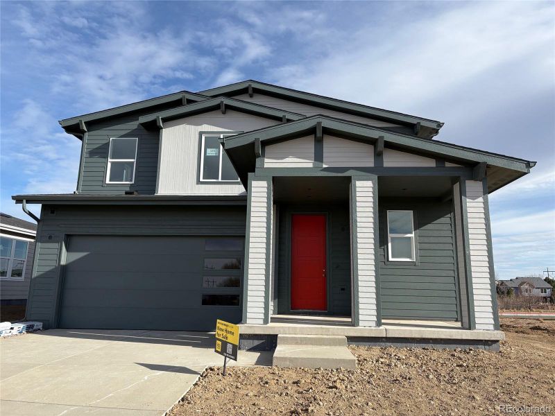 Front exterior of a new home in The Nest Classic at Canyon Creek, Erie, CO, highlighting curb appeal (Image 1). Front exterior of a new home in The Nest Classic at Canyon Creek, Erie, CO, highlighting curb appeal (Image 1).