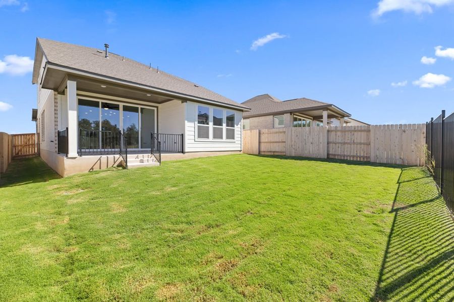 Exterior details and patio area of a home in Terrace Collection at Lariat, Liberty Hill (Image 24). Exterior details and patio area of a home in Terrace Collection at Lariat, Liberty Hill (Image 24).