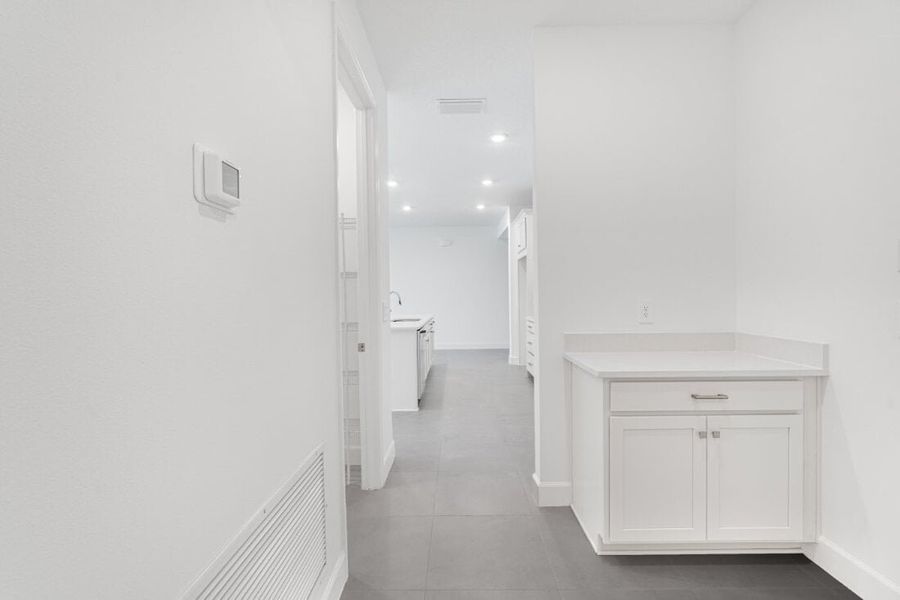 Representative unfurnished interior of a home built from the Saint Clair by Taylor Morrison in Harvest at Ovation, Winter Garden (Image 36).